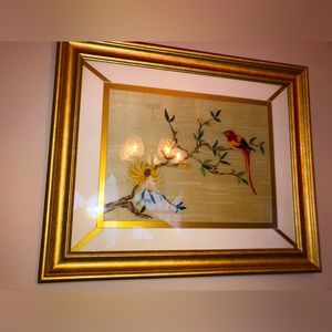 Hand stitched tropical bird picture